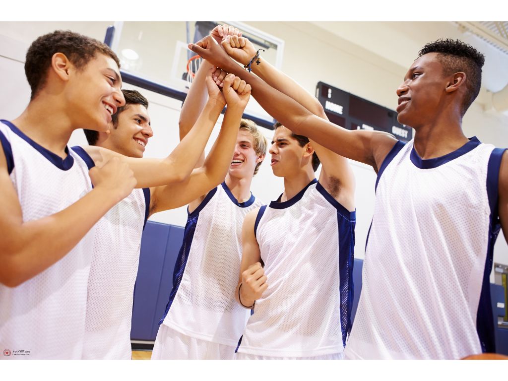 Canadian high school's basket ball team doing high fives